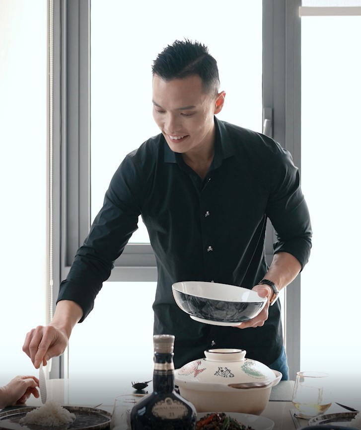 Vincent Pang serving rice