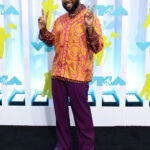 Khalid wearing Versace