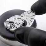 The brilliant-cut diamond pavé dial is set with 0.5 ct diamonds and baguette-cut black spinel indexes (Credit: Bulgari)