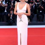 Emma Chamberlain wearing vintage Roberto Cavalli and Cartier