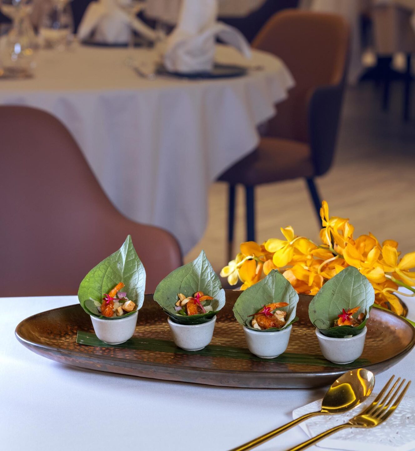 Sarai's dried prawns and wild ginger wrapped with betel leaves