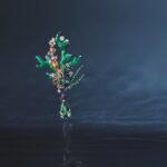 Chasse aux Trésors brooch in white, rose gold, titanium and chrysoprase, with a tsavorite garnet, green tourmaline, Mandarin garnets, emeralds, sapphires and diamonds (Credit: Chaumet)