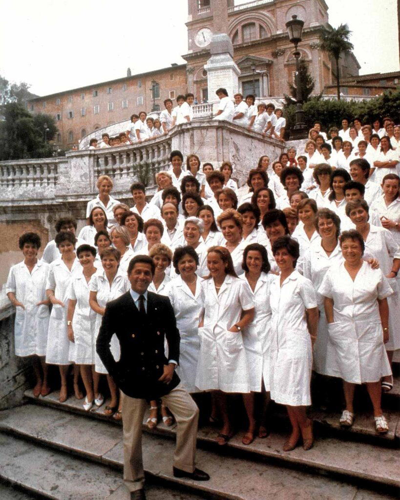 Valentino Garavani and the Valentino atelier team on the Spanish Steps in Rome (Credit: Valentino)