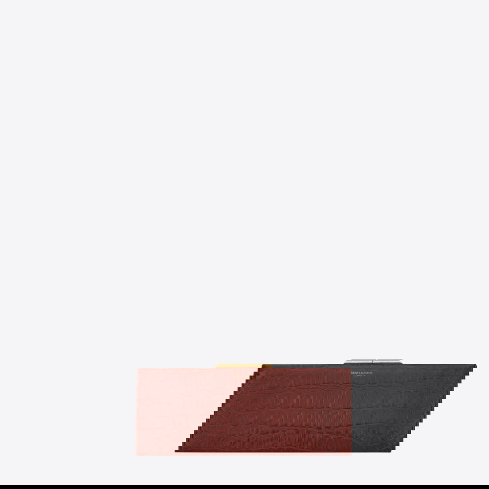 Small Midnight clutch in dark caramel crocodile embossed leather (Credit: Saint Laurent)