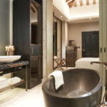 Each and every room is outfitted with a bathtub