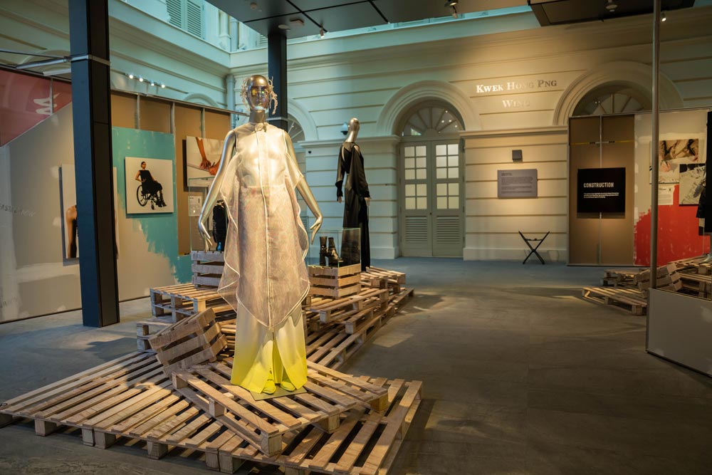 Singapore Stories 2021 winner Jon Max Goh’s look is paired with shoes designed by Charles & Keith’s Firdaos Pidau (Credit: Asian Civilisations Museum)