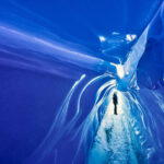 There is nothing else on earth quite like this 200-metre-long tunnel of iridescent blue ice (Credit: White Desert)