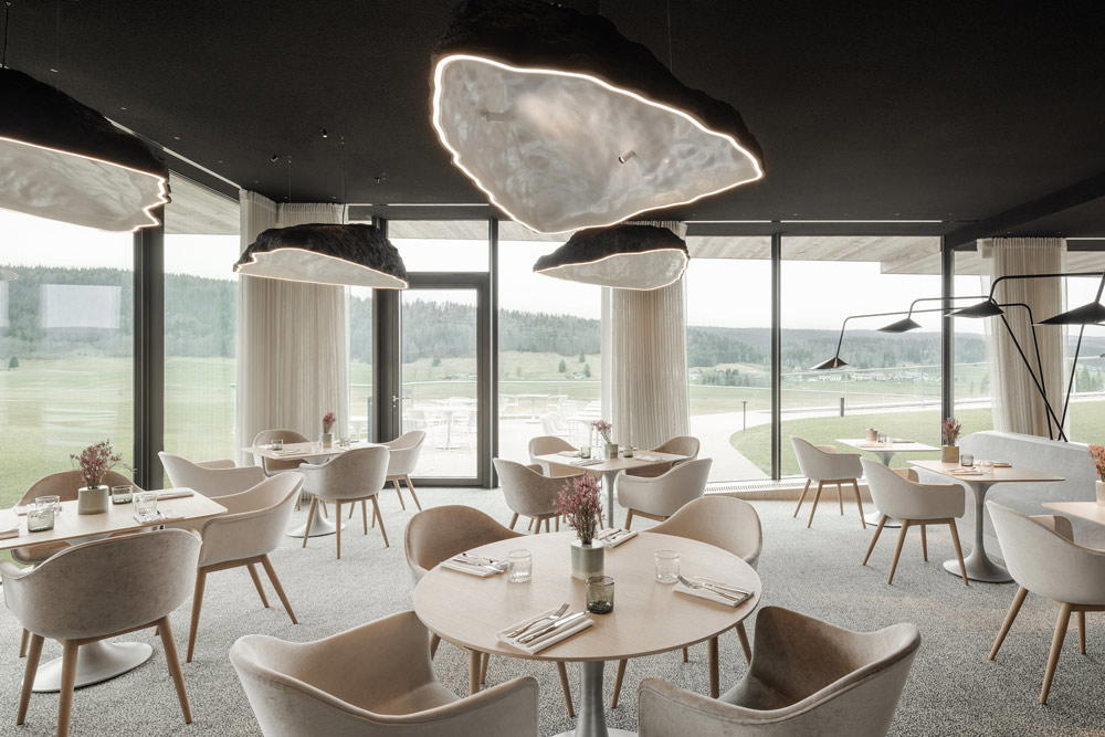 Helmed by Chef Emmanuel Renaut, three-Michelin-starred Le Gogant presents refined local cuisine in convivial décor inspired by Vallée de Joux