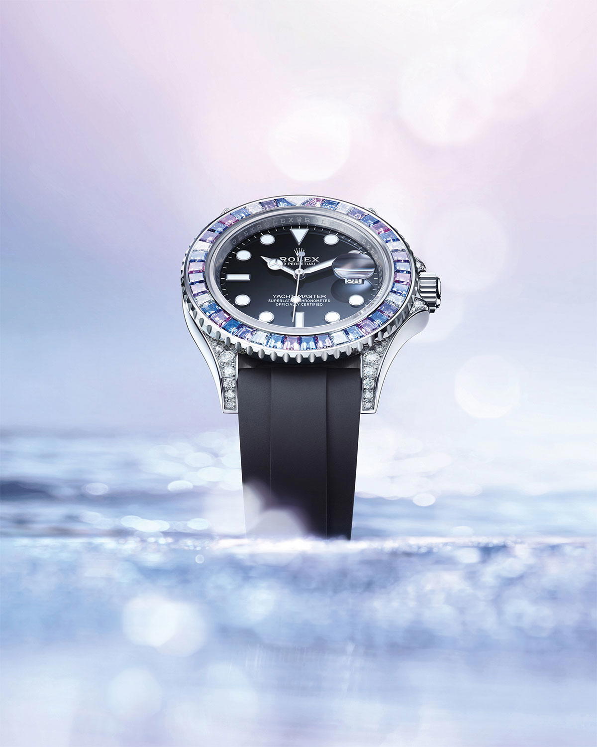 Cast from white gold — a first for the model — the Oyster Perpetual Yacht-Master 40 features a. rotatable bezel set with trapeze-cut precious stones