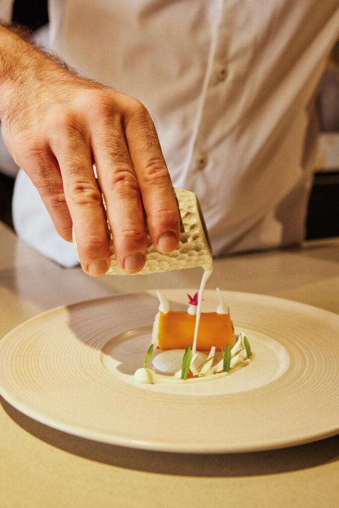 The chef's Hokkaido hairy crab, sea buckthorn, green almond, spruce, buttermilk, and tarragon