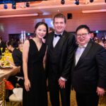 Mr. Laurent Bernasconi, flanked by Mr. and Mrs. Raymond Lim