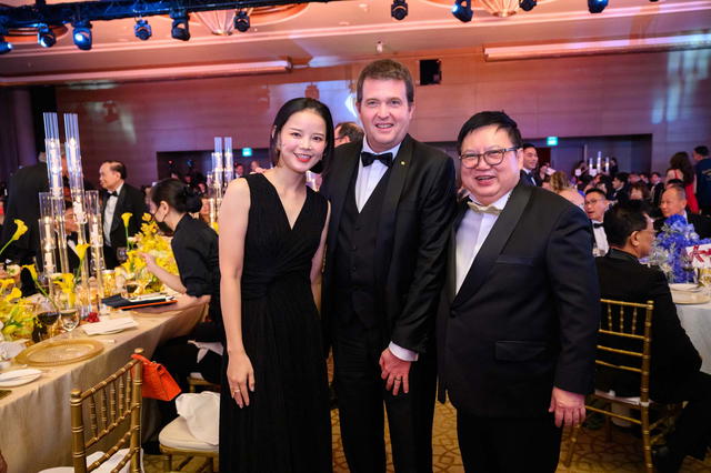 Mr. Laurent Bernasconi, flanked by Mr. and Mrs. Raymond Lim
