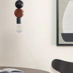 Jellis ceiling lamp with circle in solid mango wood with black and natural finish