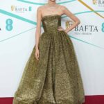 Wearing Louis Vuitton (Credit: Getty Images)