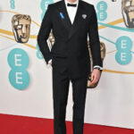 Wearing Gucci (Credit: Getty Images)