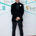 Wearing Giorgio Armani (Credit: Getty Images)