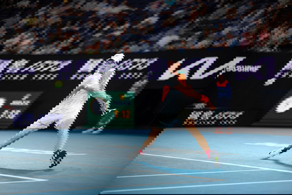 Rolex Testimonee Jannik Sinner in position to hit a backhand at the 2022 Australian Open