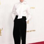 Wearing&nbsp;<strong>Saint Laurent by Anthony Vaccarello</strong> (Credit: Saint Laurent)