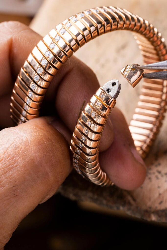 Each bracelet is set with individually molded, polished and gem-set rings assembled on a titanium blade (Credit: Bulgari)