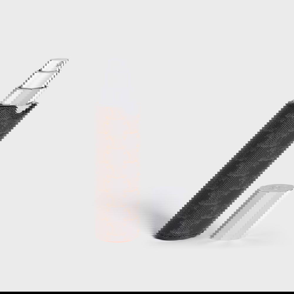 Triomphe canvas and calfskin travel spray case, from&nbsp;Celine