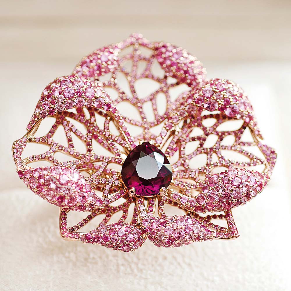 Orchid cocktail ring in rose gold set with 1,200 pink sapphires and rhodolites—A natural Sri Lankan purple spinel of 3.07ct (Credit: D&A Jewellery)