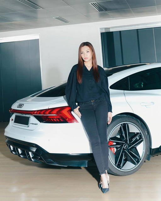 Evelyn Hew with the Audi RS e-tron GT (Credit: Cher Him)