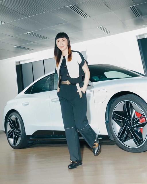 Karen Cheah with the Audi RS e-tron GT (Credit: Cher Him)