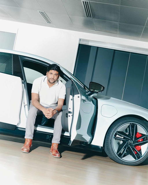 Travin Singh with the Audi RS e-tron GT (Credit: Cher Him)