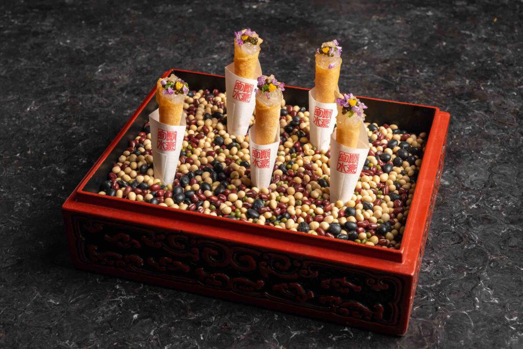 The amuse bouche: ice cream served with white shrimp and caviar