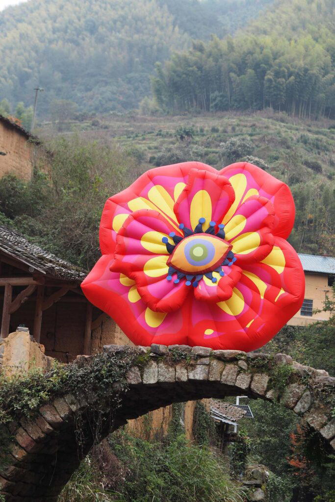 These big floral sculptures are placed prominently in villages across China to highlight the plight of disappearing villages and lost craftsmanship