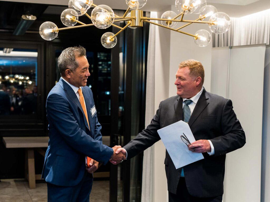 Mr. Joon Aun Ooi, President, Wyndham Hotels & Resorts Asia Pacific congratulating Mr. Rob Neil, Managing Director at Safari Group at the event