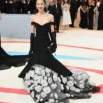 Wearing <strong>Tory Burch</strong> (Credit: Getty Images)