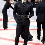 Wearing <strong>Versace</strong> (Credit: Getty Images)