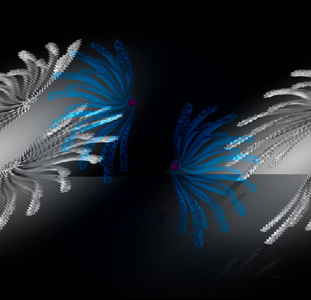 Paradise Earrings in titanium and platinum with diamonds and sapphires (Credit: Wallis Hong)