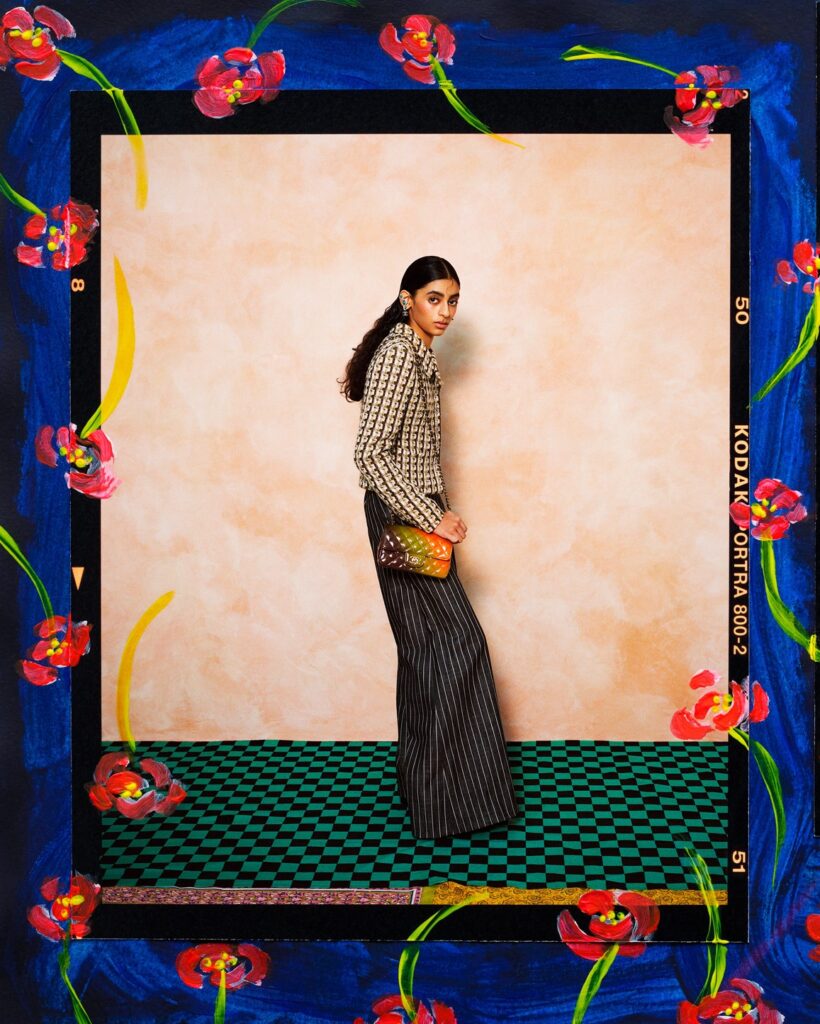Wool tweed jacket, striped denim trousers, shaded patent calfskin bag, and metal, calfskin and strass earrings, all from Chanel (Credit: Stefan Khoo)