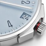 An angular crown guard secures the screw-down crown and its winding mechanism from impact. A red warning ring indicates that the crown is not yet screwed in (Credit: Nomos Glashütte)