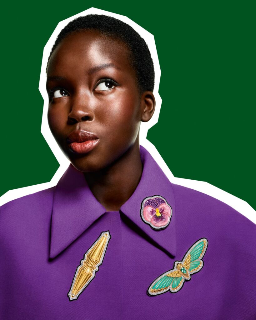 Jack brooch in yellow and white gold with diamonds and lacquer; Pansy brooch in white and yellow gold, and titanium, with sapphires, pink quartz, amethysts, rhodolites, diamonds, lacquer and mother-of-pearl; Cicada brooch in white gold with diamonds, sapphires, chrysoprases, lacquer and a 2.14-ct Mozambique tourmaline (Credit: Boucheron)