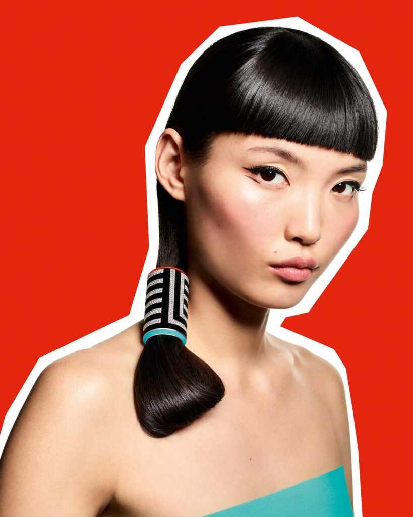 I Got Your Back hair jewel in white gold, magnesium and bio acetate with lacquer and diamonds (Credit: Boucheron)