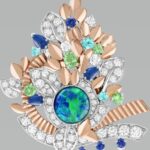 Symphonie de l’eau clip in white and rose gold with one 5.88-ct Australian black opal, sapphires, garnets, tourmalines and diamonds (Credit: Van Cleef & Arpels)