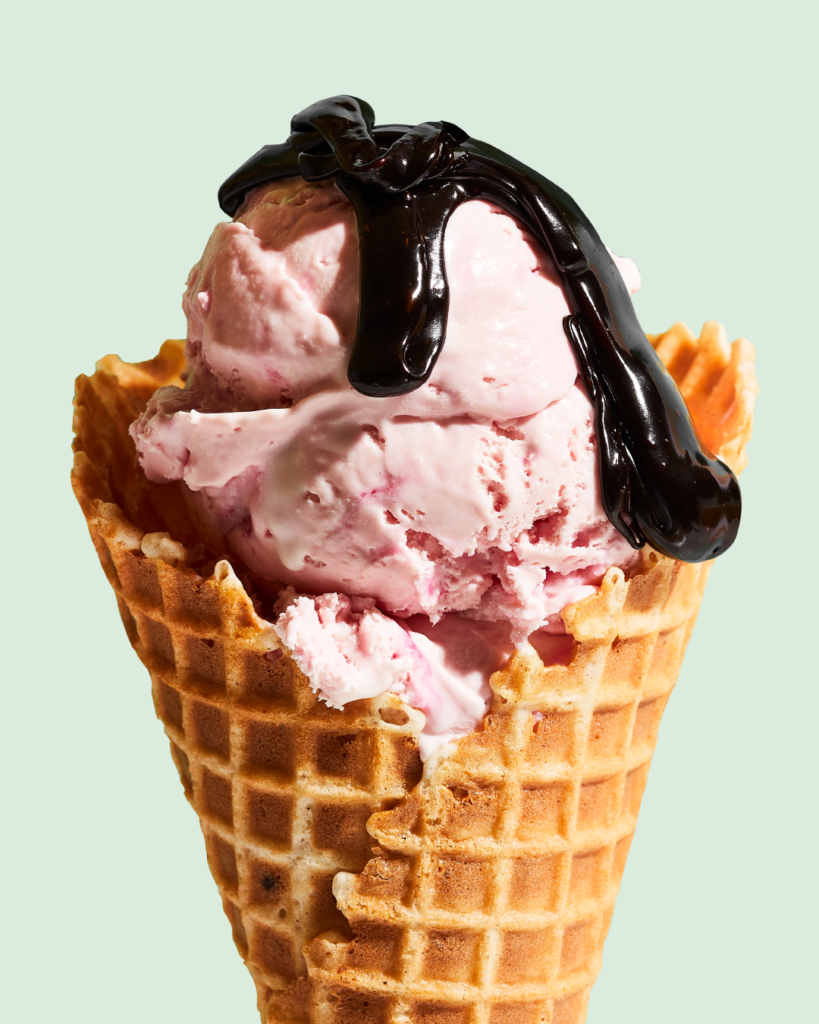 Waffle cone topped with hot fudge