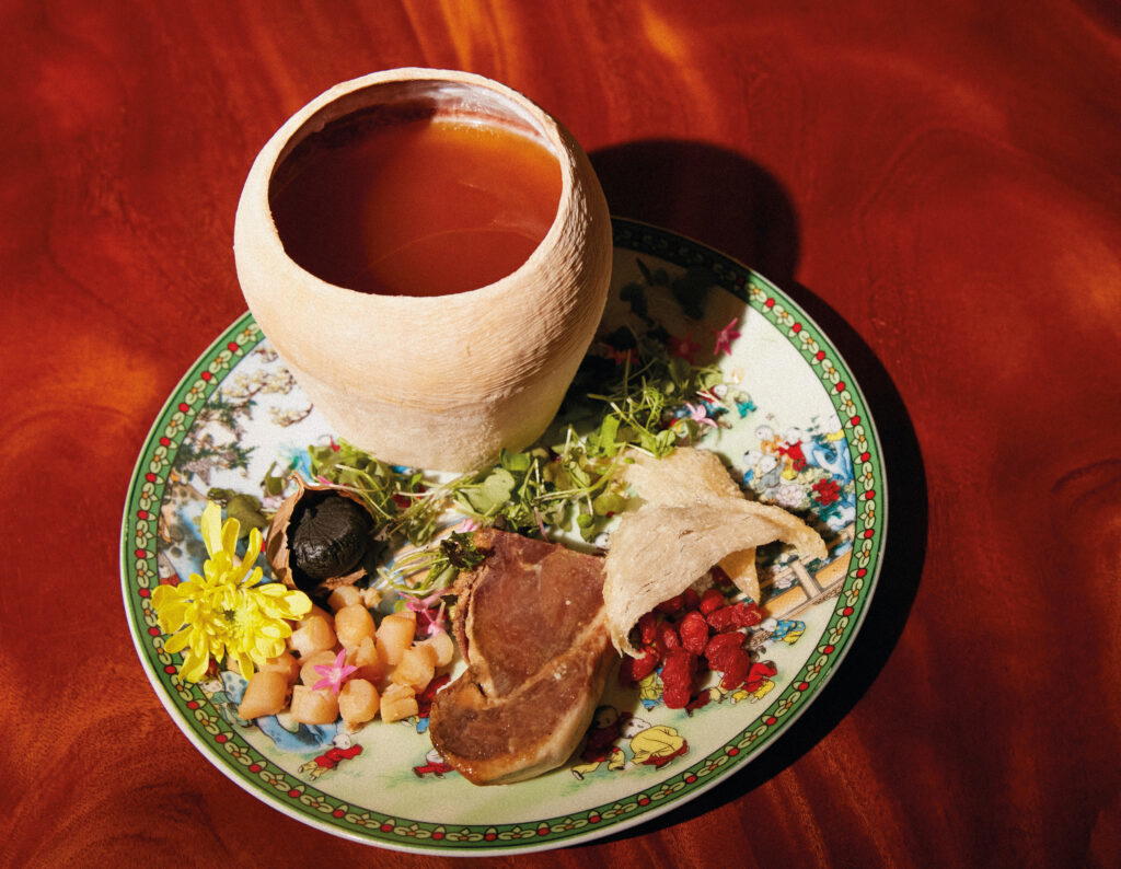 Hainan-style black chicken soup