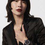 Model wearing the J12 Night Star 38mm in highly resistant ceramic and steel with diamonds (Credit: Chanel)