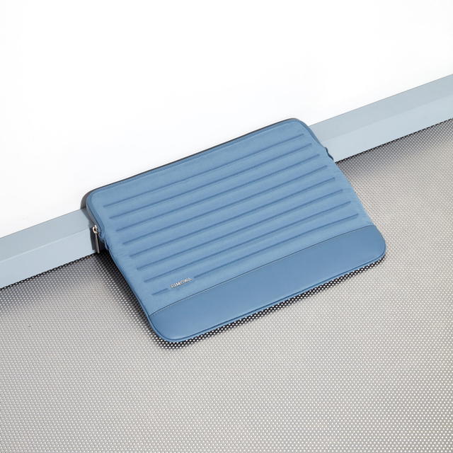 The Rimowa Flat Pouch in Arctic Blue from the Never Still collection