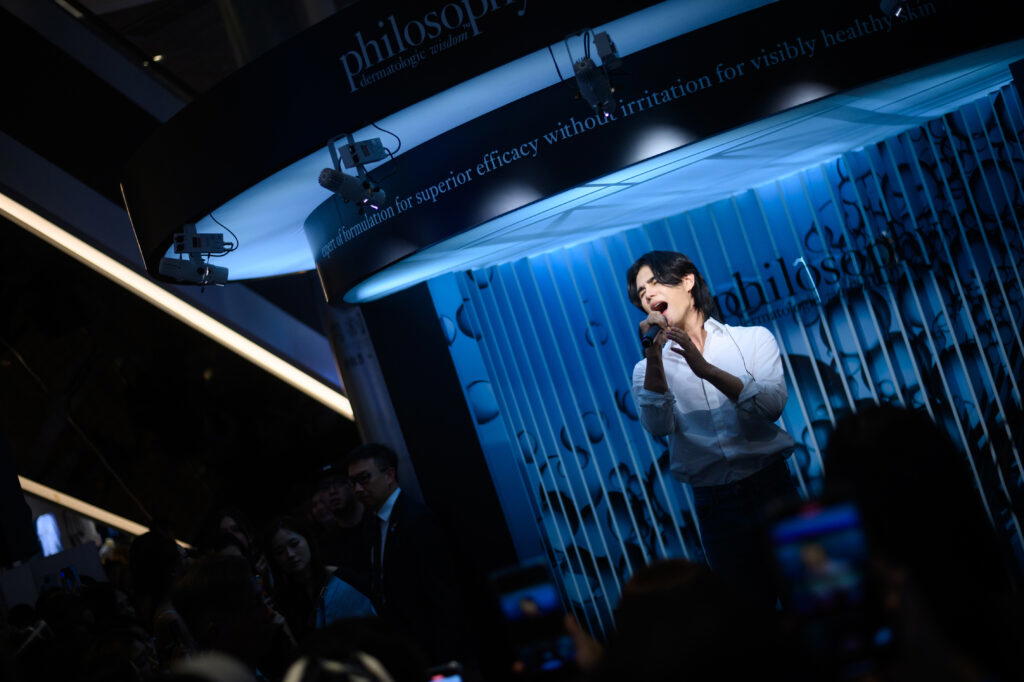 Jeff Satur singing at the Philosophy pop-up in Ion Orchard