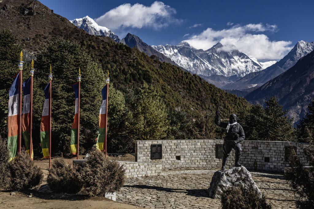 Tenzing Norgay’s statue outside his visitor centre in Namche Bazaar. The peaks of Everest and Lhotse form a striking backdrop, reminding visitors of his pioneering achievements as a mountaineer (Credit: Rolex/ Franck Gazzola)