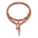 Forbidden Ruby Serpenti necklace set with delicate gold spheres, interspersed with twenty carré-cut diamonds, buff top rubies and pavé diamonds, arranged to suggest snake scales. The highlight is a 3.81 ct pear-cut cabochon ruby hanging in the middle of the necklace (Credit: Bulgari)