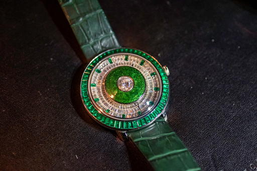 GemAddict in platinum with diamonds, emeralds, and enamel