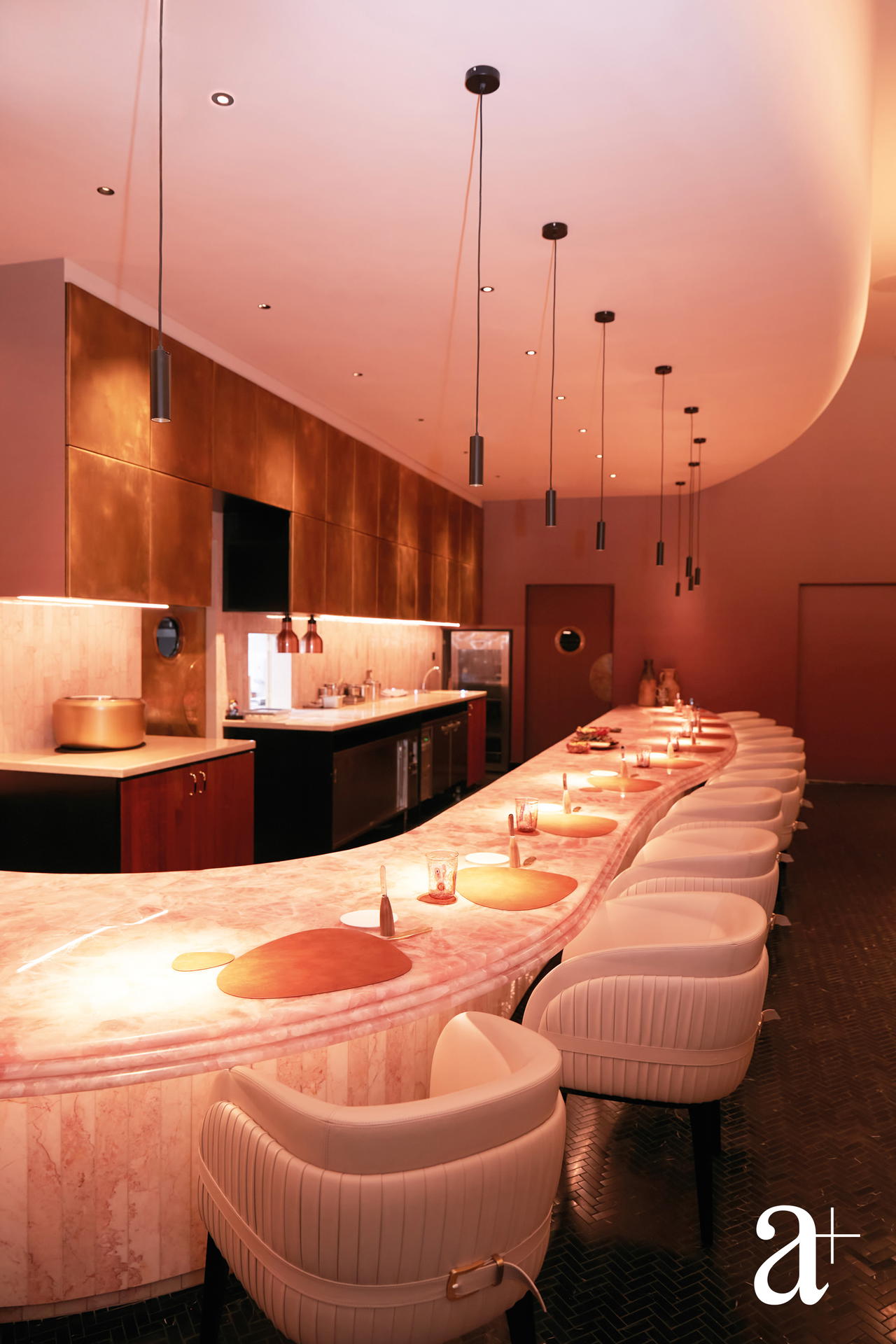 The curved rose quartz counter is the centrepiece at Araya