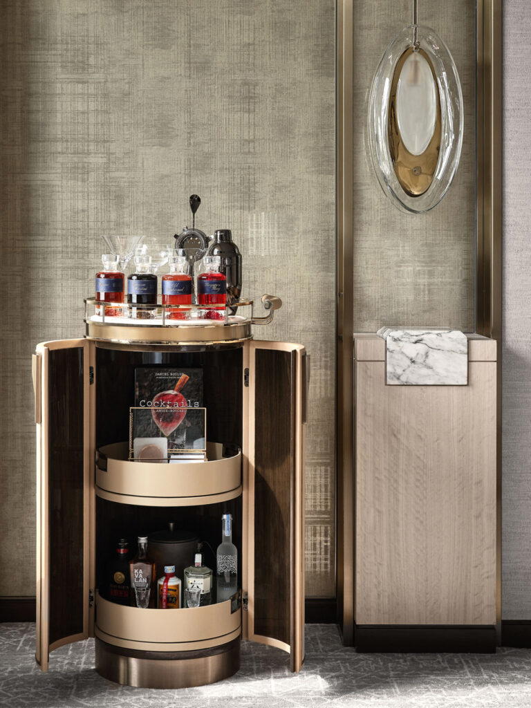 The cocktail trolley includes liquor and cocktail garnishes