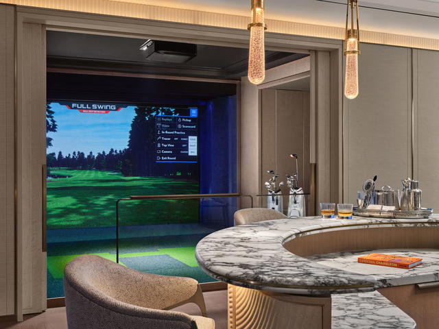 The Presidential Suite features a full swing golf simulator